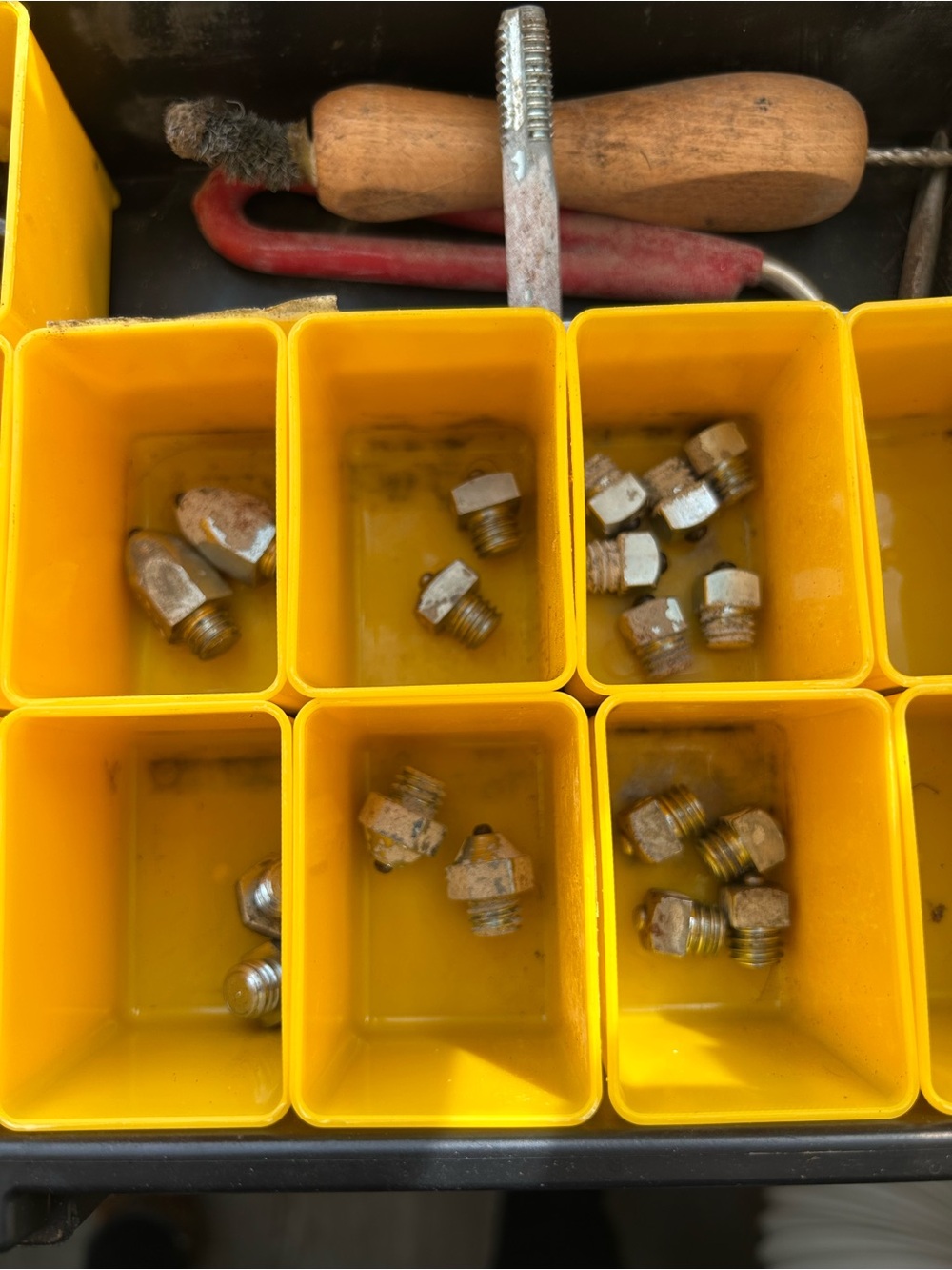 Eventing stud kit in organizational storage kit with tools